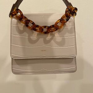 Unused Jwpei bag. Includes bag chain.